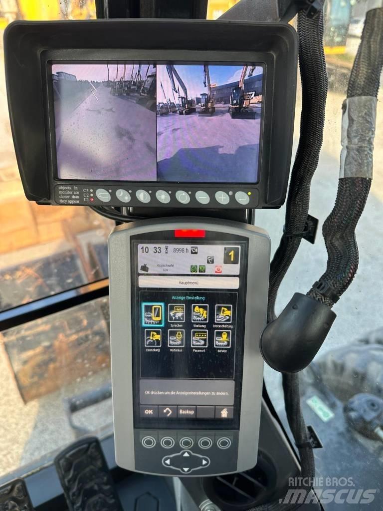 CAT M 318 F حفارات بعجل
