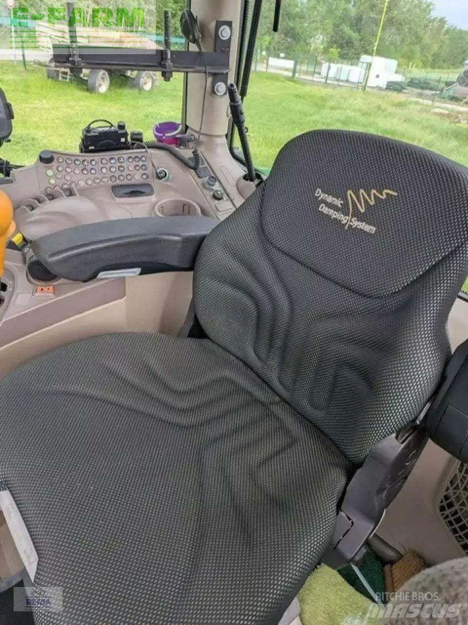 John Deere 6215 r الجرارات