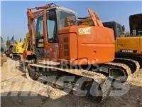 Hitachi ZX 135 US حفارات زحافة