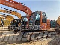 Hitachi ZX 135 US حفارات زحافة