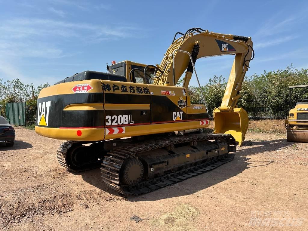 CAT 320 B L حفارات زحافة