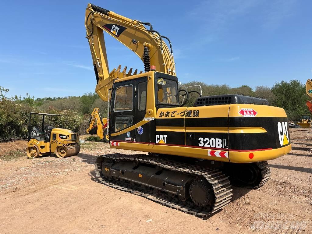 CAT 320 B L حفارات زحافة