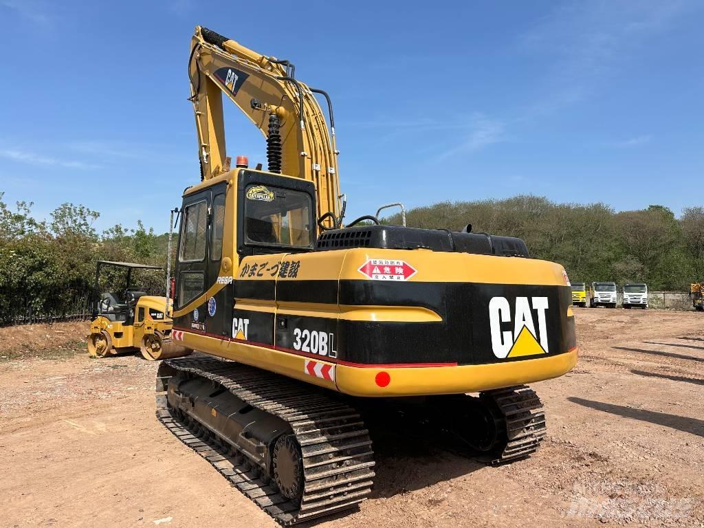 CAT 320 B L حفارات زحافة