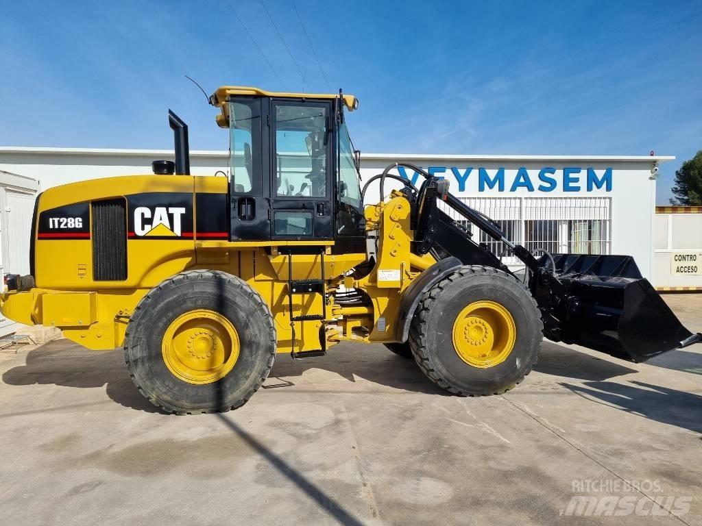 CAT IT 28 G لوادر بعجل