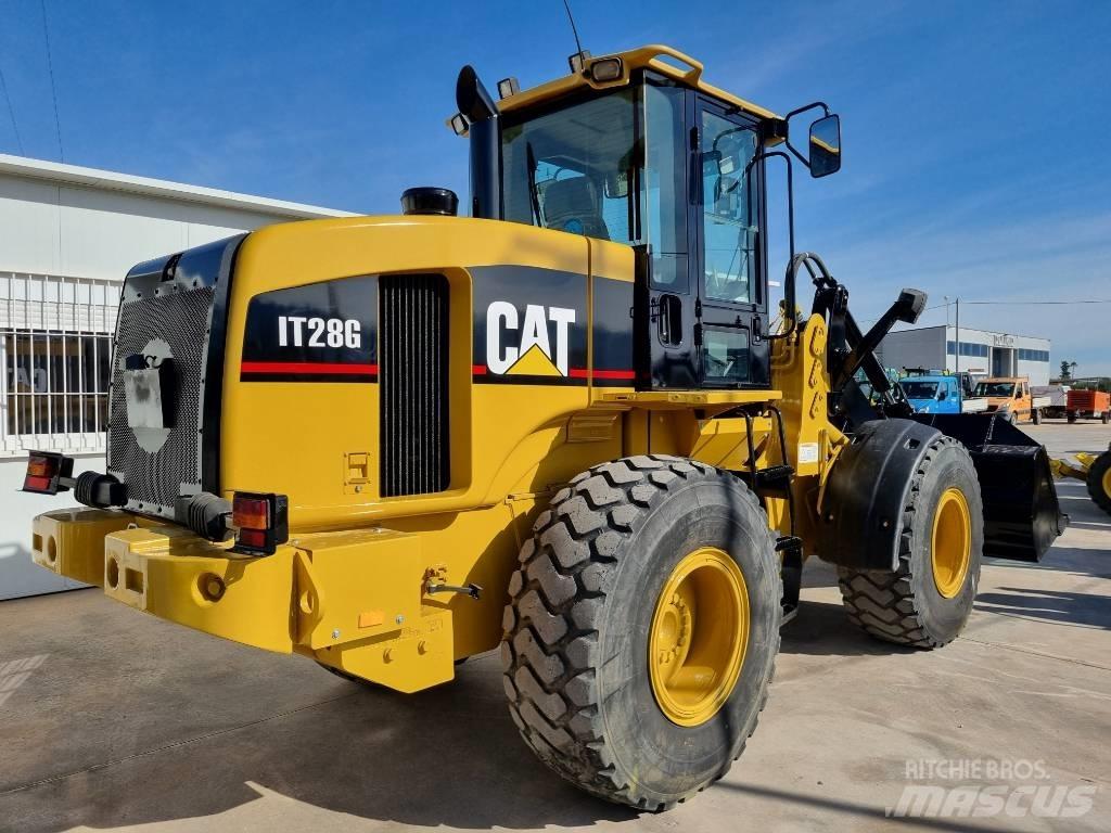 CAT IT 28 G لوادر بعجل