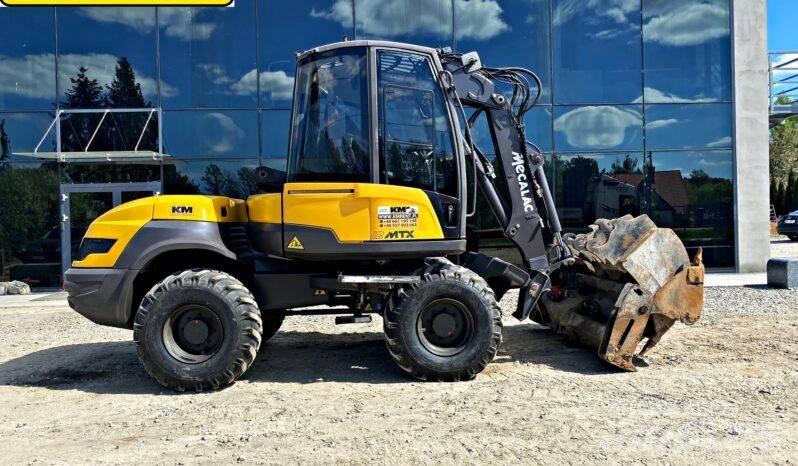 Mecalac 12 M TX لوادر ذات جرافات عكسية