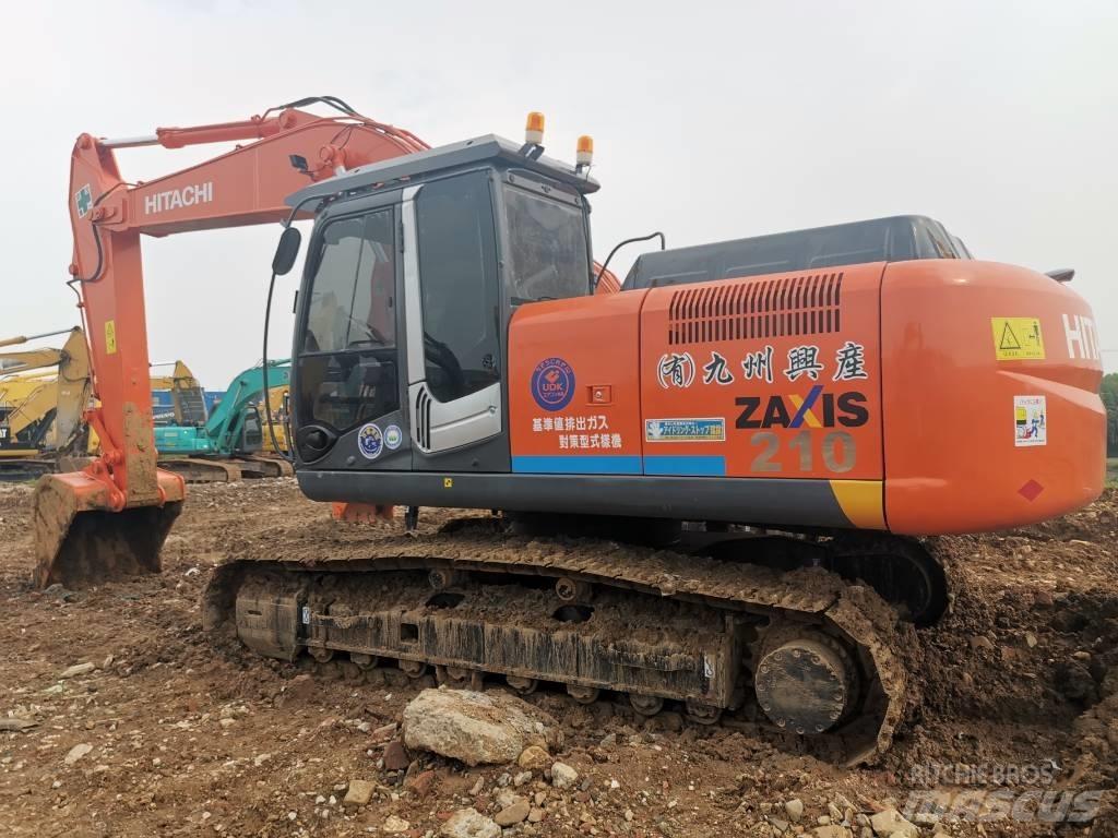 Hitachi zx210 حفارات زحافة