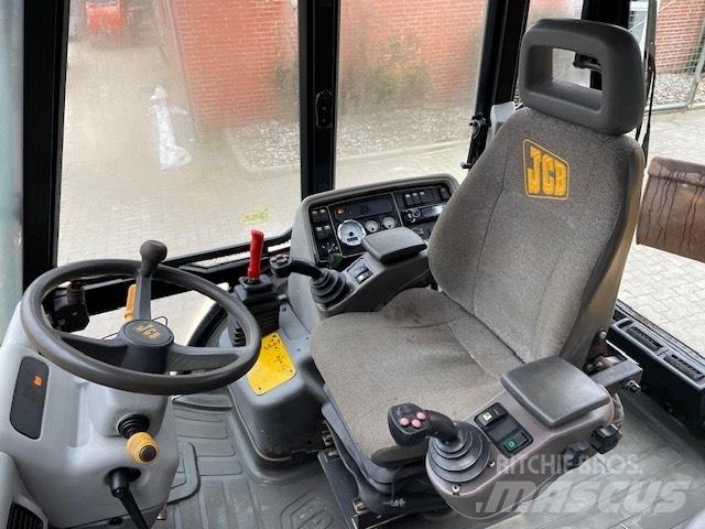 JCB 4CX لوادر ذات جرافات عكسية