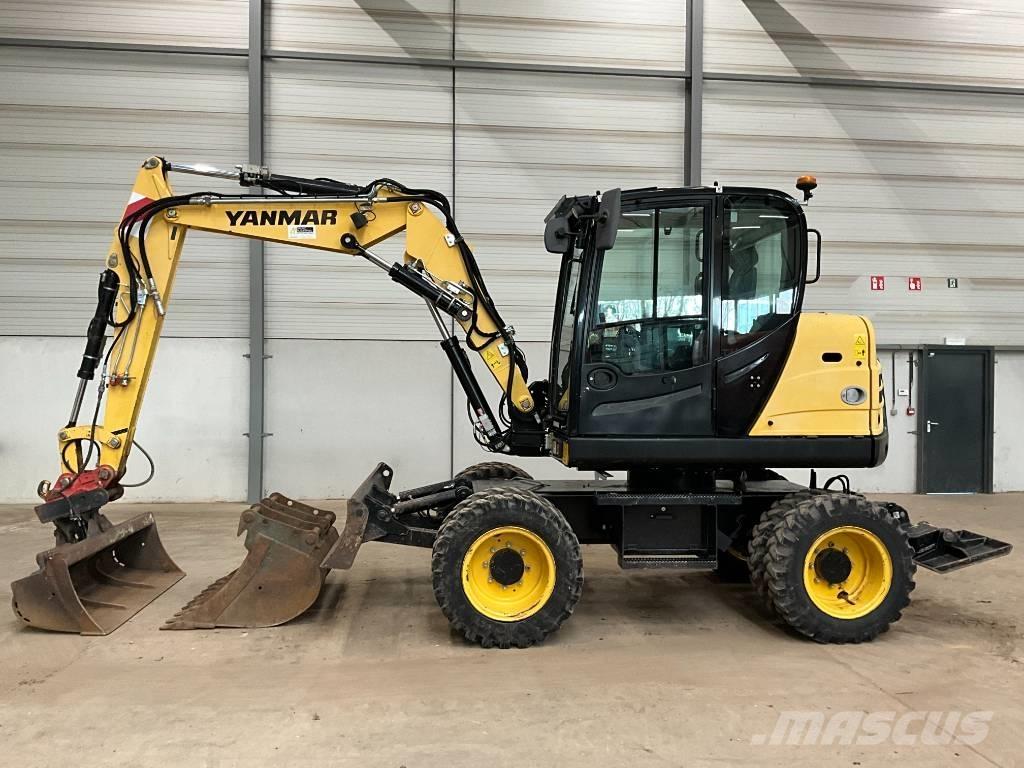 Yanmar B 75 W حفارات بعجل