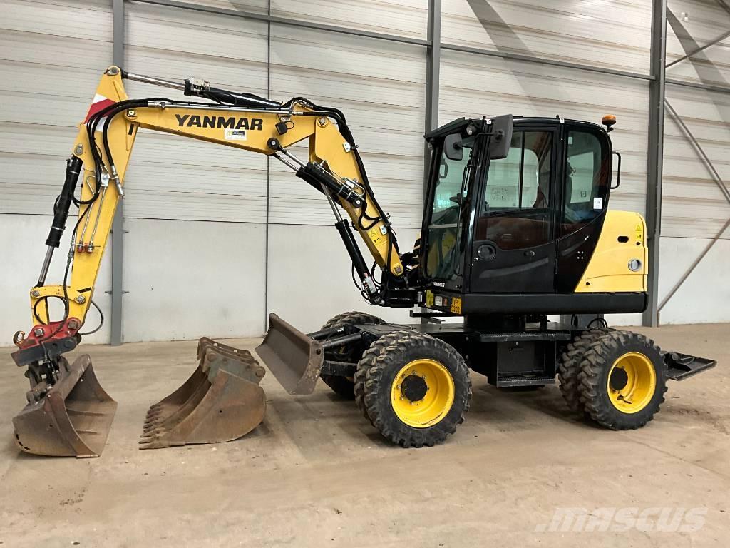 Yanmar B 75 W حفارات بعجل