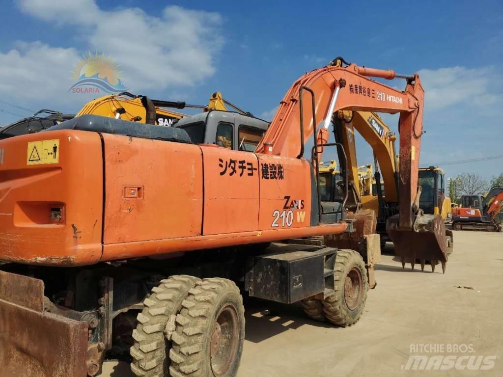 Hitachi ZX 210 W حفارات بعجل