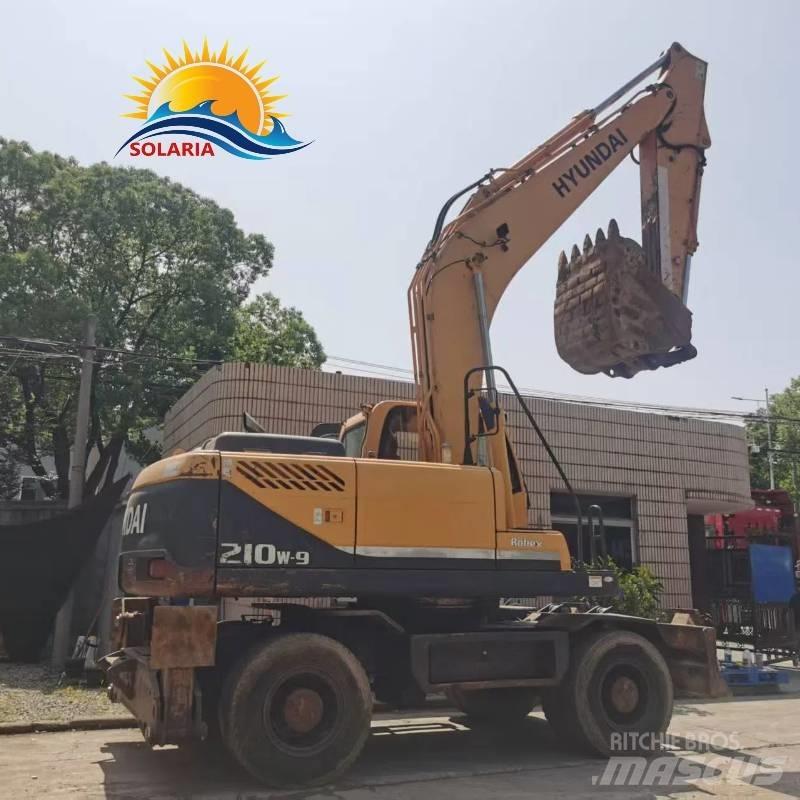 Hyundi 210w-9 حفارات بعجل