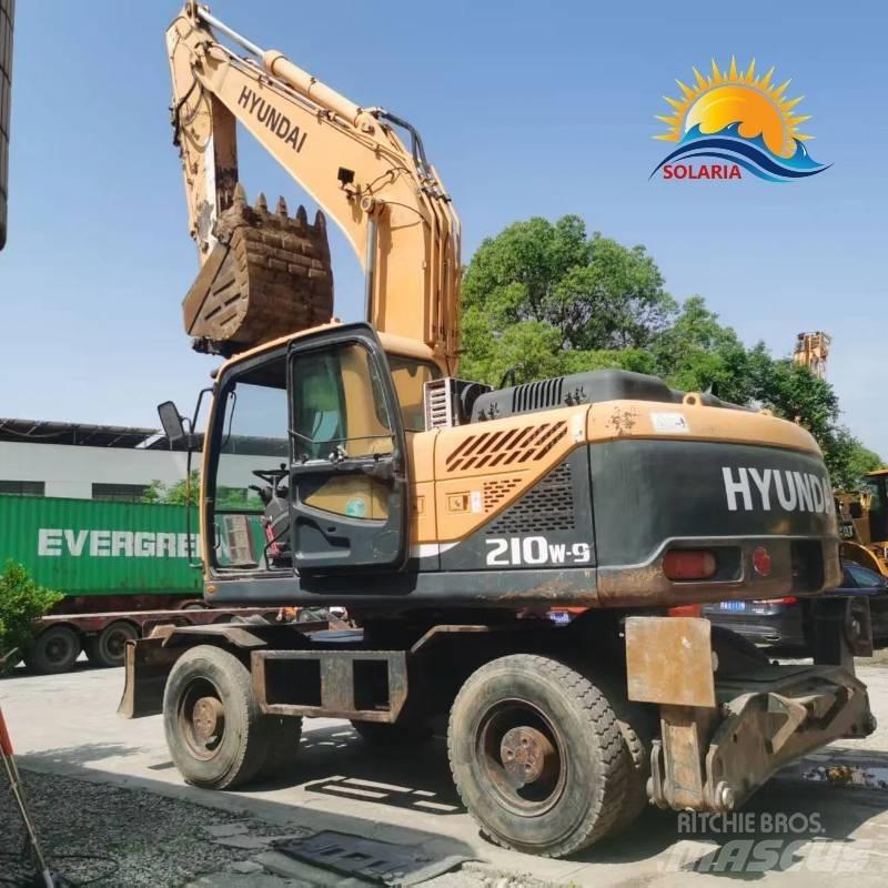 Hyundi 210w-9 حفارات بعجل