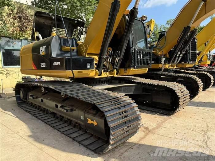 CAT 329 D L حفارات زحافة