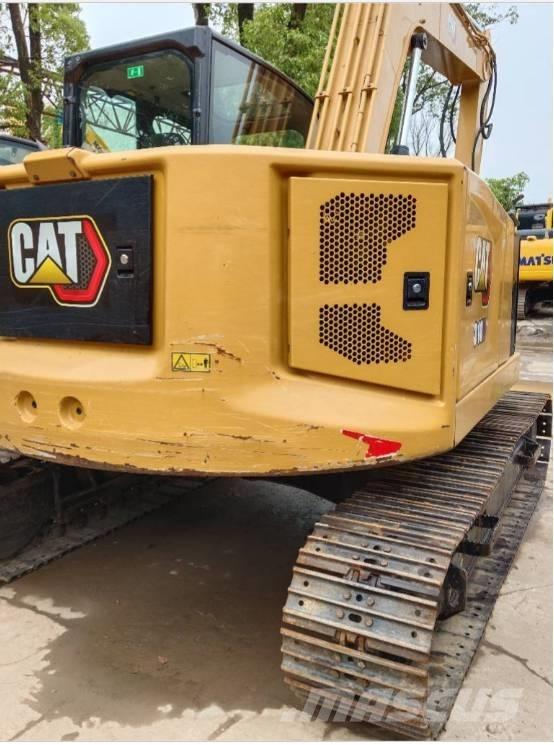 CAT 310 حفارات زحافة
