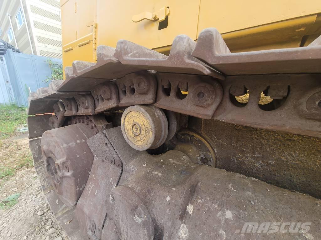 CAT 973 لوادر زحافة