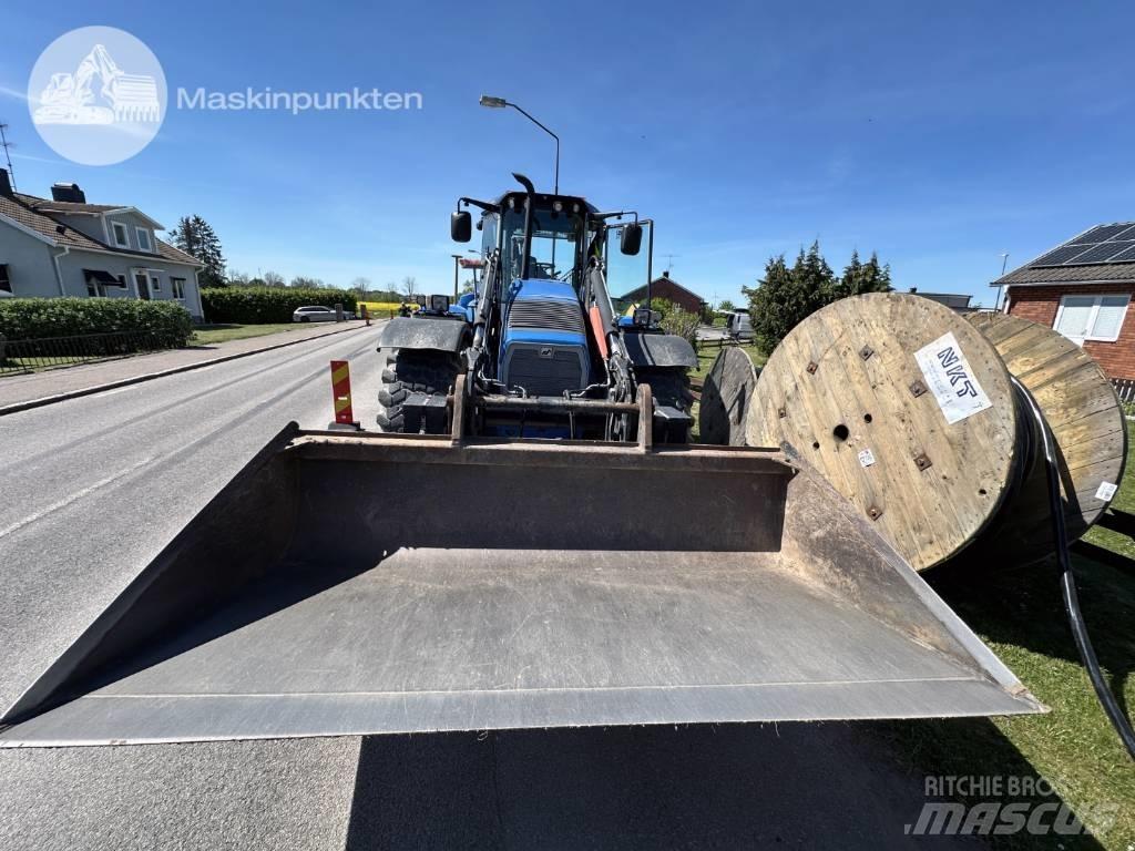 Huddig 1260 C لوادر ذات جرافات عكسية