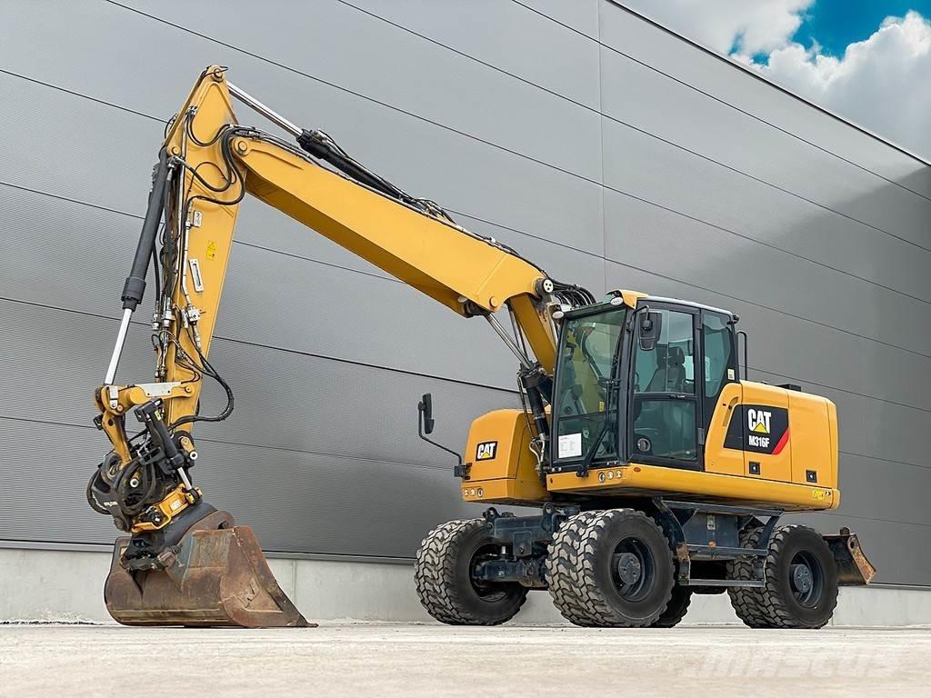 CAT M316F حفارات بعجل
