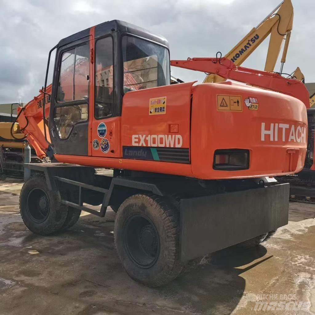 Hitachi EX 100 W D حفارات بعجل