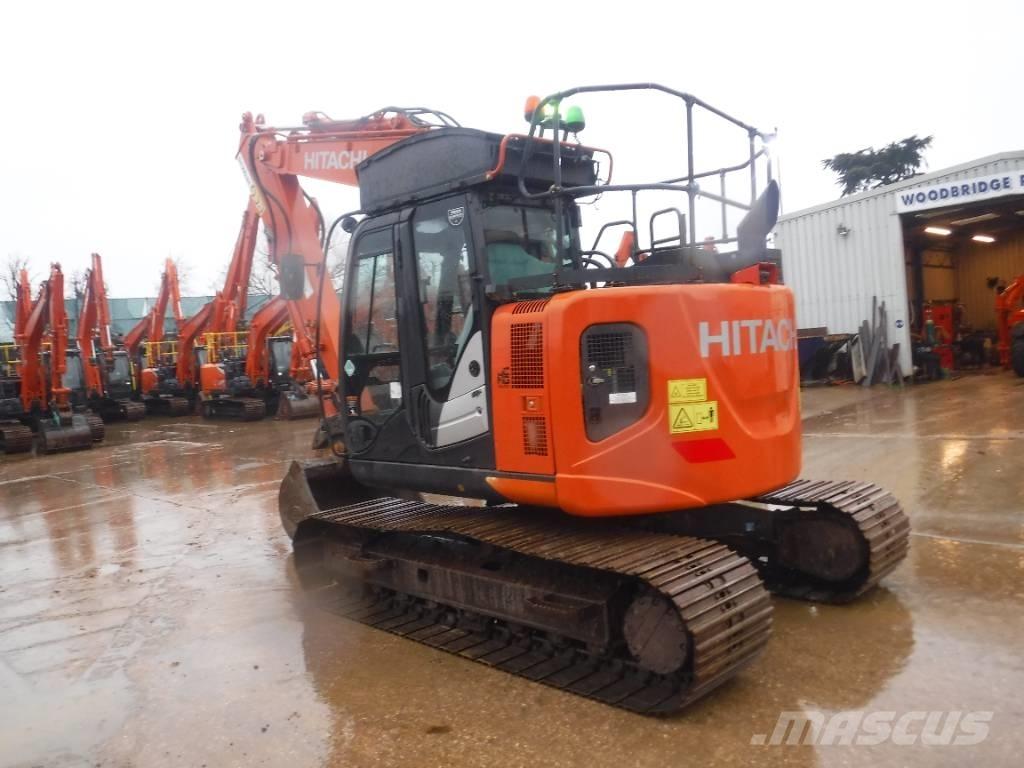 Hitachi ZX 135 US-6 حفارات زحافة