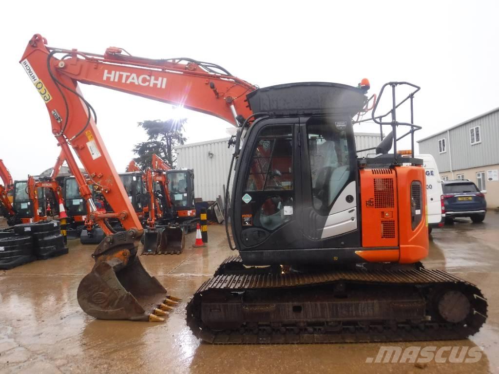 Hitachi ZX 135 US-6 حفارات زحافة