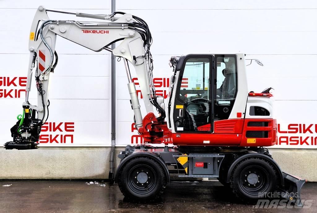 Takeuchi TB 395 W حفارات بعجل