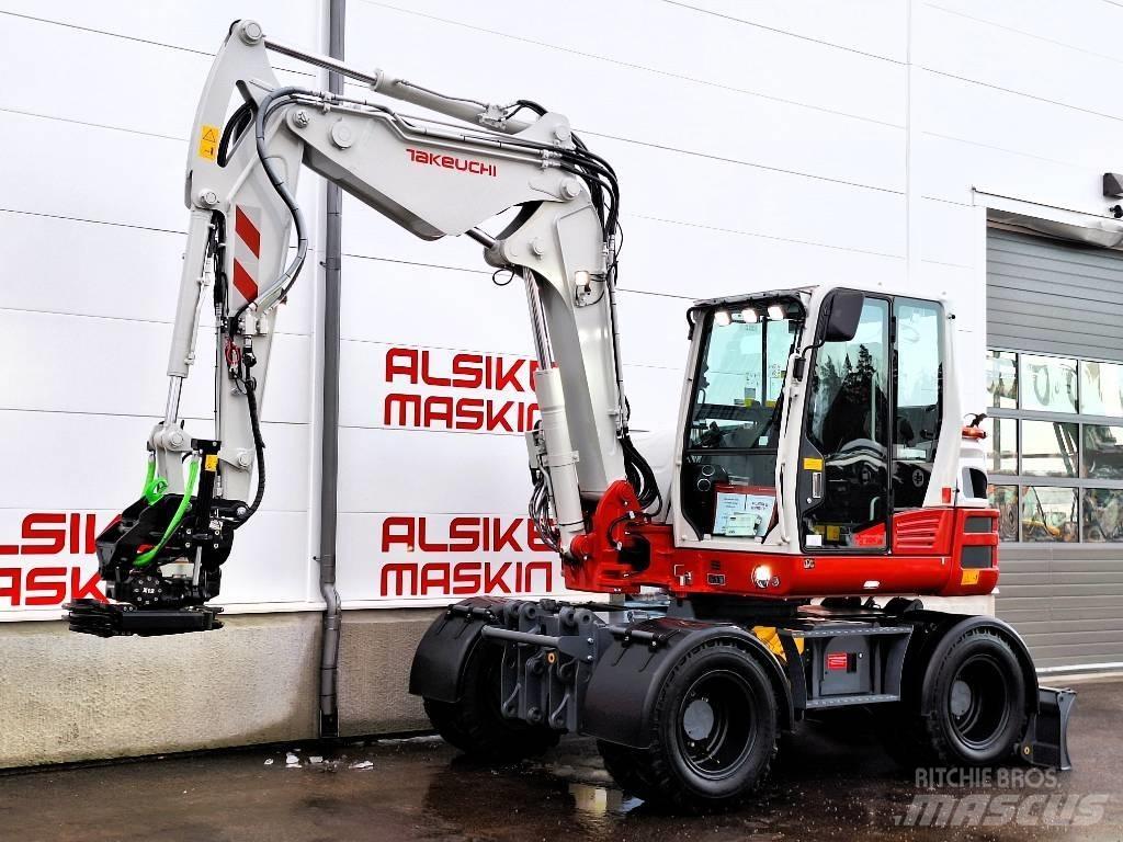 Takeuchi TB 395 W حفارات بعجل
