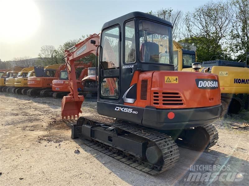 Doosan DX 55 حفارات بعجل