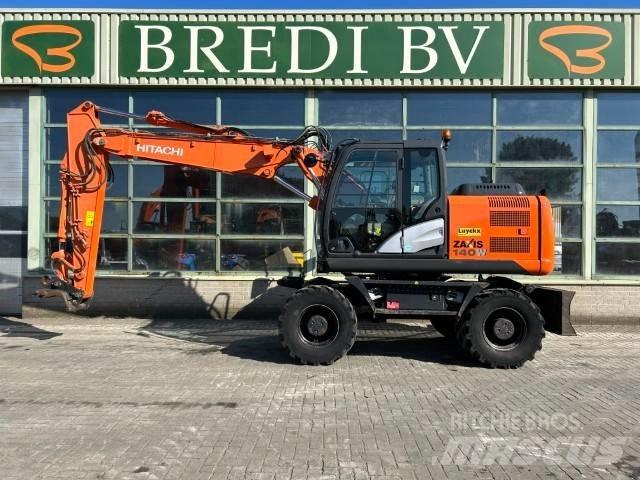 Hitachi ZX 140 W-5B حفارات بعجل