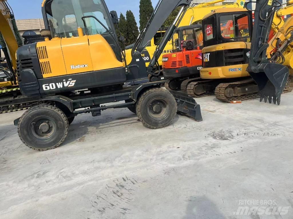 Hyundai R60W-9 حفارات بعجل