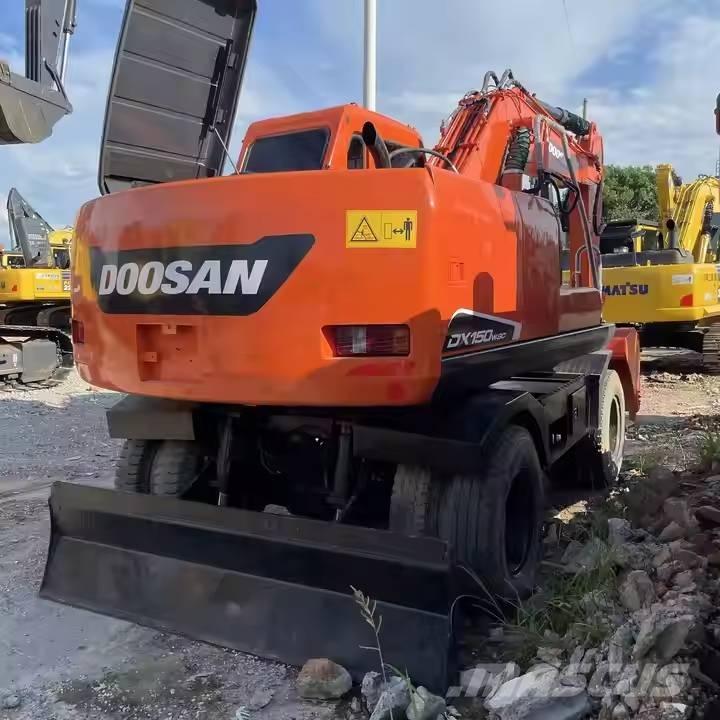 Doosan DX150W-9C حفارات بعجل