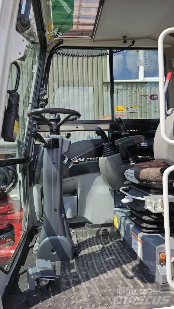 Takeuchi TB295W حفارات بعجل