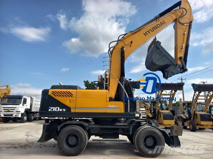 Hyundai 210W-9 حفارات بعجل