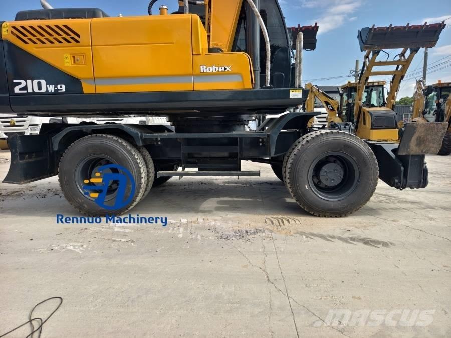 Hyundai 210W-9 حفارات بعجل