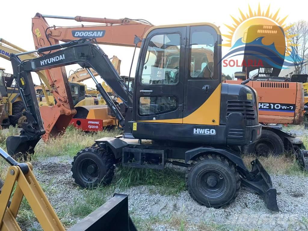 Hyundai R60W HW حفارات بعجل