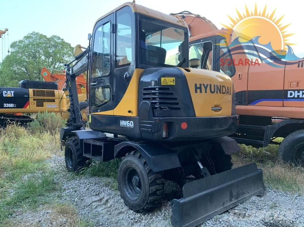 Hyundai R60W HW حفارات بعجل