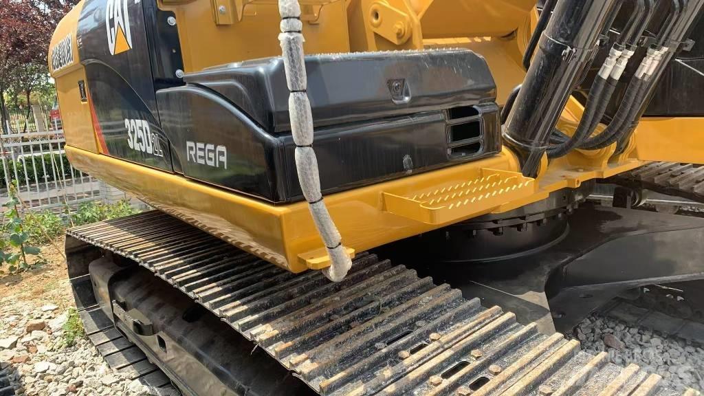 CAT 325 B L حفارات زحافة