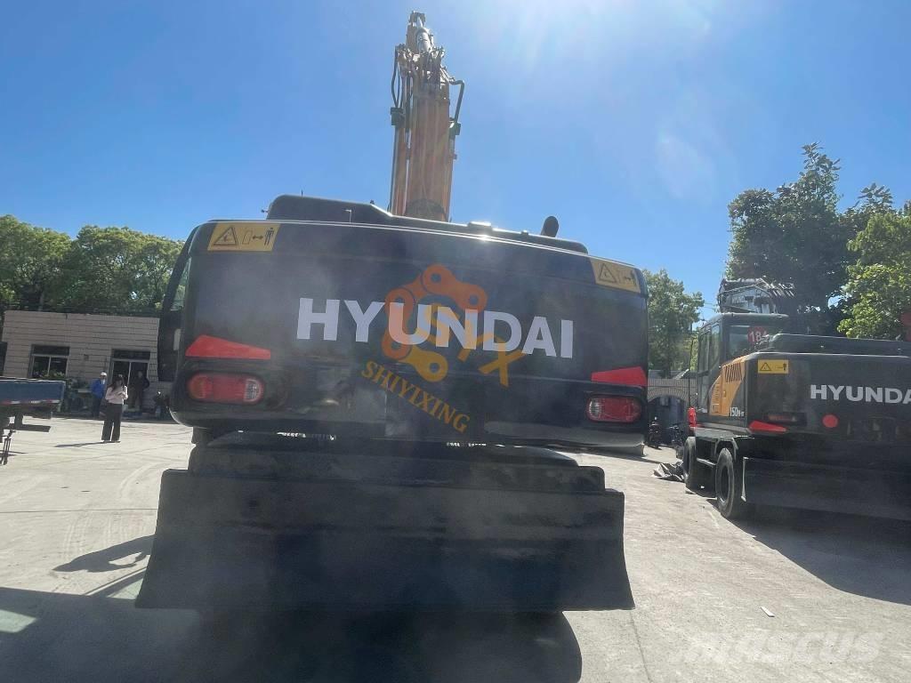 Hyundai 210W-9 حفارات بعجل