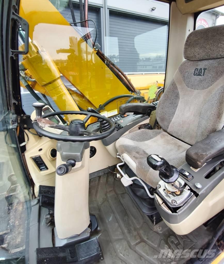 CAT M 316 C حفارات بعجل