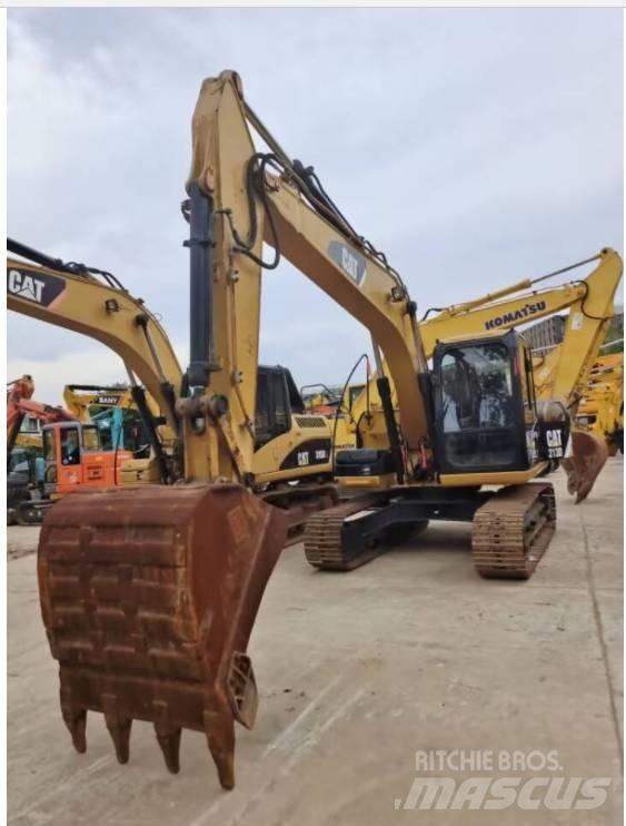 CAT 313 D حفارات زحافة