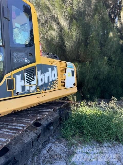 Komatsu HB 215 LC-1 حفارات زحافة