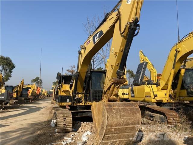 CAT 318D حفارات زحافة