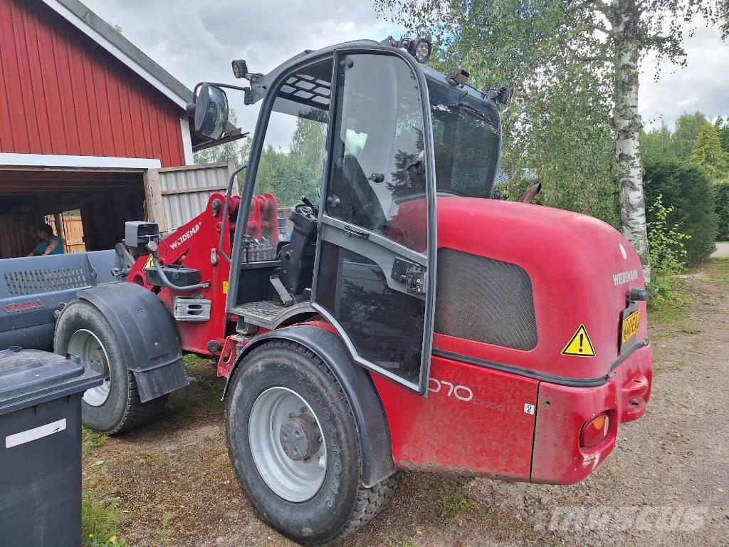 Weidemann 4070CX100 لوادر بعجل