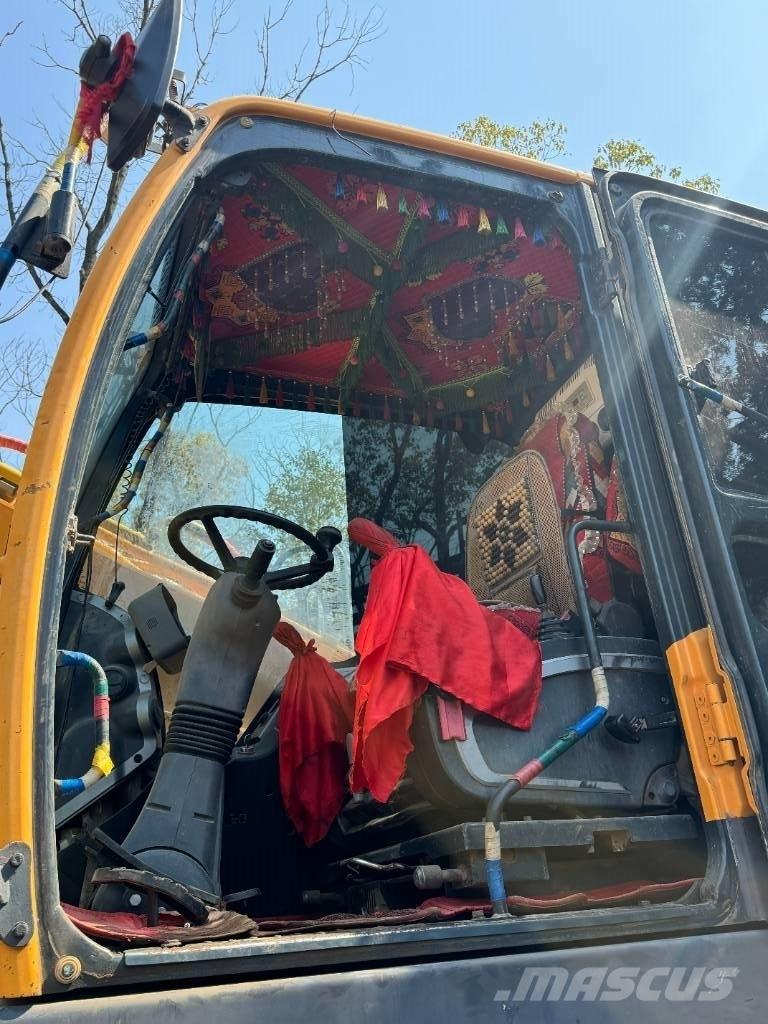 Hyundai 210W-9 حفارات بعجل