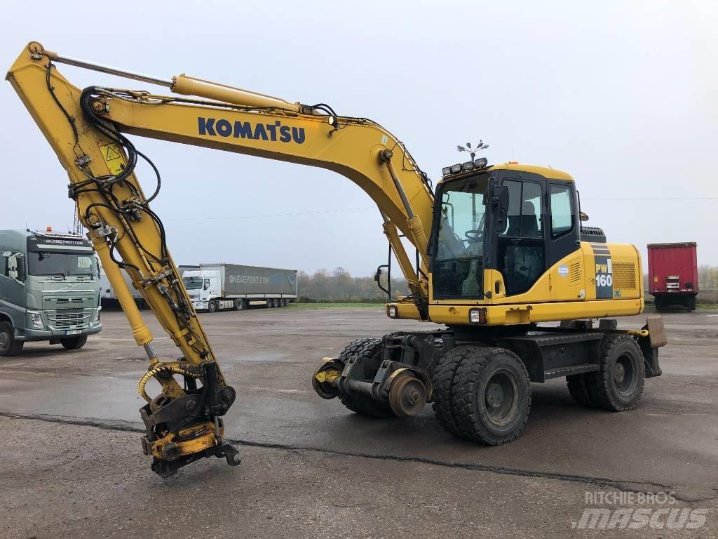 Komatsu PW160-7E0 حفارات بعجل