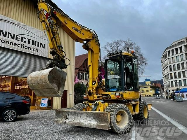 Komatsu PW 98 MR حفارات بعجل
