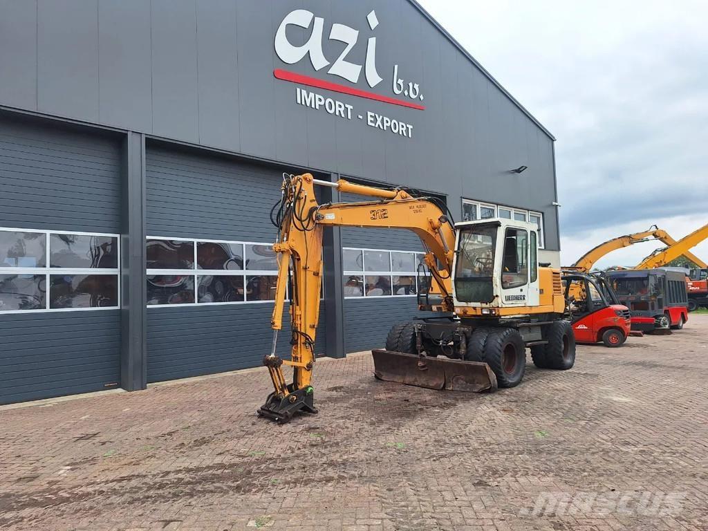 Liebherr A312 حفارات بعجل