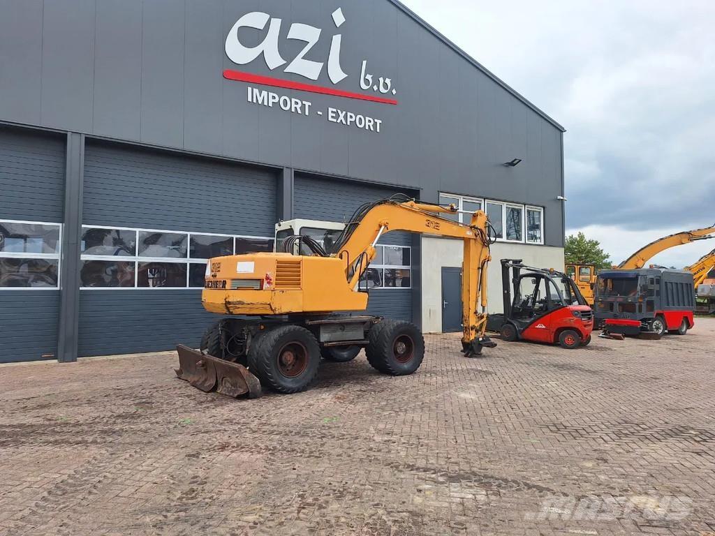 Liebherr A312 حفارات بعجل