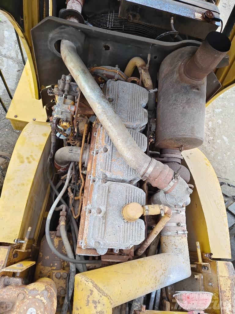 CAT 980 G لوادر بعجل