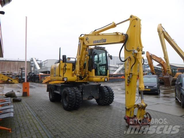 Komatsu PW 140-7 حفارات بعجل
